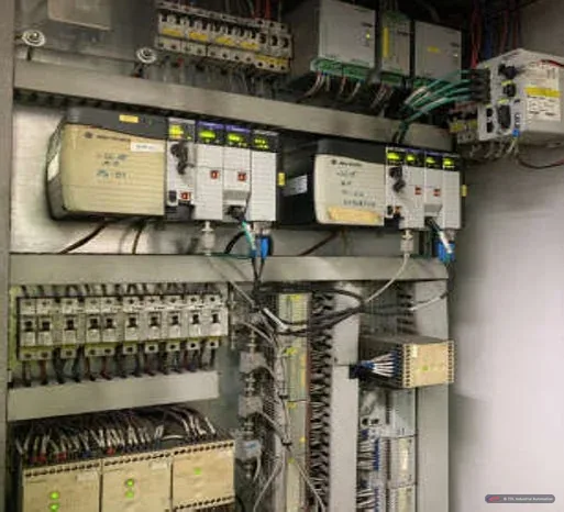 Allen-Bradley controllers and I/O in a control panel of the conveyor and packing system