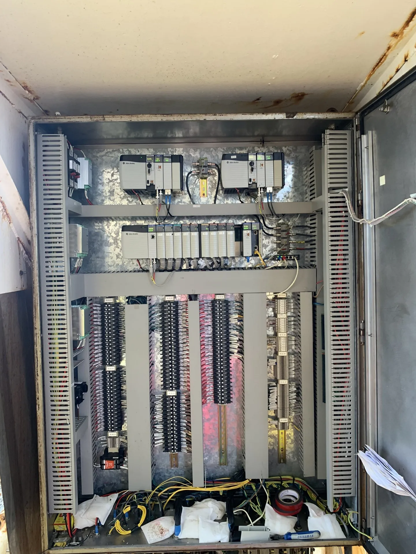 Compressor control panel with two ControlLogix CPU chassis above the I/O chassis
